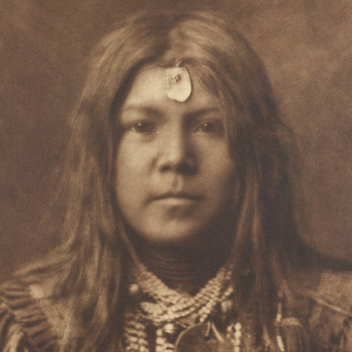 Photograph of young member of the Apache tribe