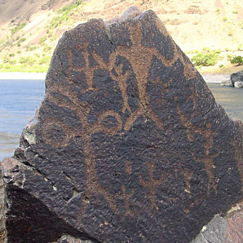 Petroglyph of various humanoid forms