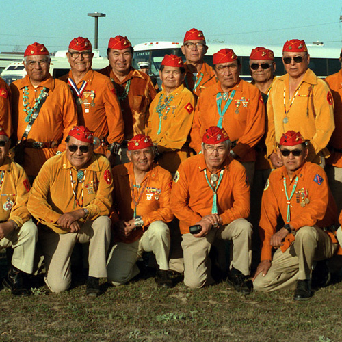 Members of the 3rd and 4th Division Navajo code talker platoons of World War II dressed in their unit's uniform