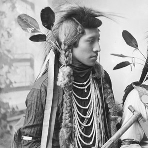 Photograph of two men from Northern Shoshone or Bannock tribe in traditional dress