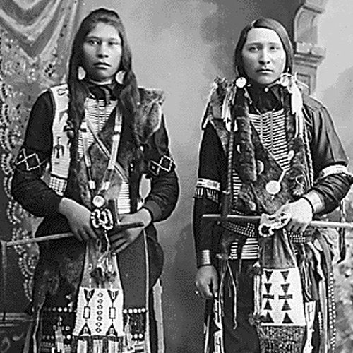 Photograph of two adult men from the Boise Valley Shoshone and Northern Shoshone tribes in traditional dress